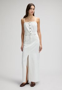 Джинсовый комбинезон