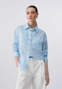 Шелковая блузка