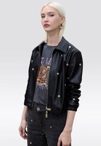 Кожаная куртка Кожаная куртка