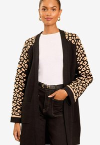 Длинный жилет Длинный жилет