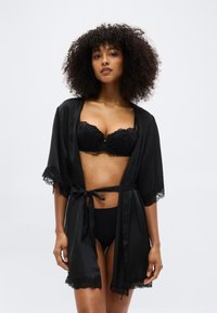 Бюстгальтер на косточках