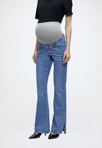 Джинсы для беременных