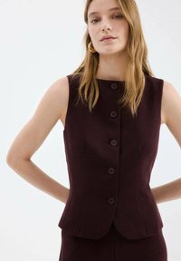 Жилет Жилет