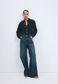 Джинсовый комбинезон