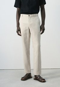 Льняные брюки
