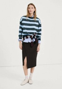 Пуловер в полоску Пуловер в полоску