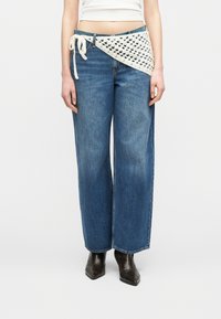 Свободные джинсы Свободные джинсы