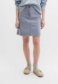 Юбка с накладными карманами