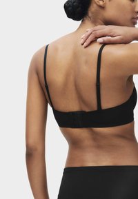 Бюстгальтер на косточках