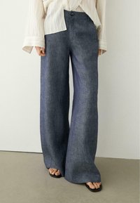 Свободные джинсы