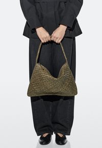 Кожаная сумка