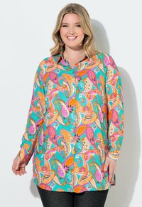 Длинная блузка