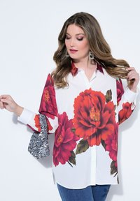 Длинная блузка