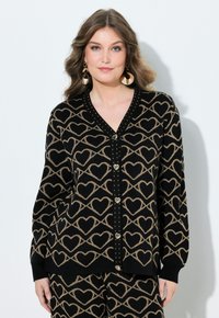 Жаккардовая вязаная кофта