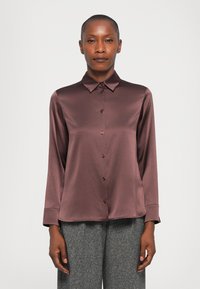 Шелковая блузка