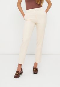 Узкие брюки