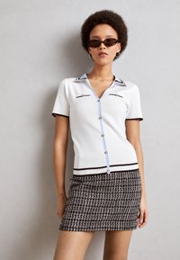 Пуловер с коротким рукавом