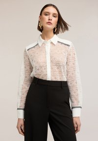 Кружевная блузка