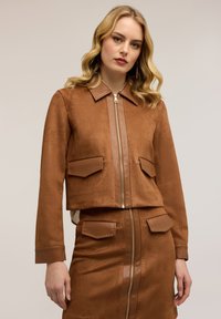 Кожаная куртка