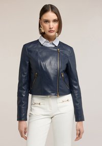 Байкерская куртка