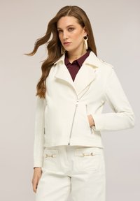 Байкерская куртка