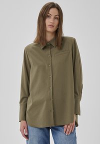 Длинная блузка Длинная блузка