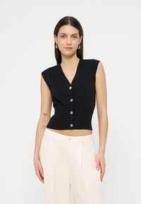 Джинсовая жилетка