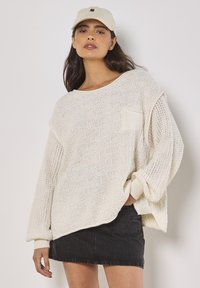 Длинный пуловер