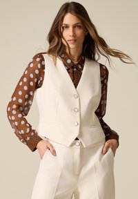 Джинсовая жилетка Джинсовая жилетка