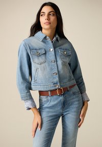 Джинсовая куртка