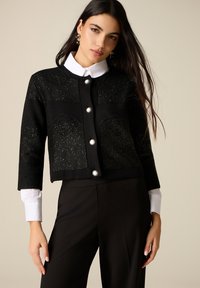 Жилет Жилет