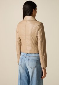 Байкерская куртка