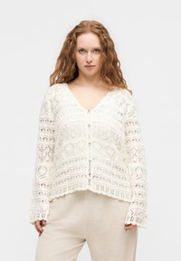 Вязаная кофта