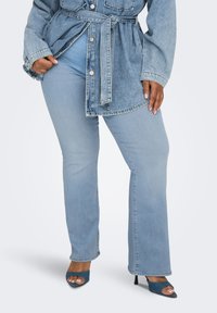 Клешеные брюки