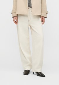 Свободные джинсы