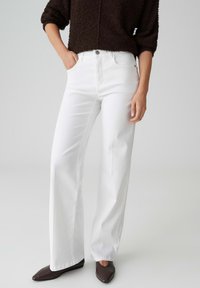 Прямые джинсы