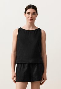 Блузка без рукавов