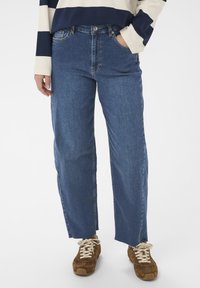 Прямые джинсы