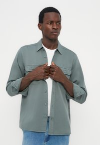 Рубашка Рубашка