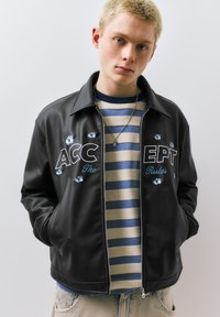 Кожаная куртка