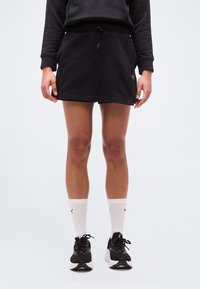 Юбка с накладными карманами Юбка с накладными карманами