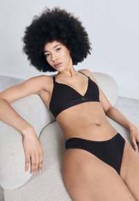 Бюстгальтер на косточках Бюстгальтер на косточках