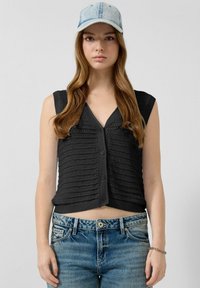 Джинсовая жилетка Джинсовая жилетка