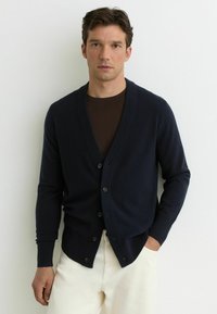 Вязаная кофта