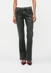 Клешеные джинсы Клешеные джинсы