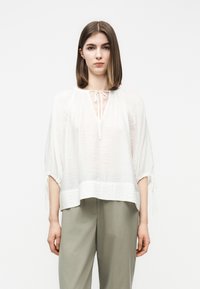 Шелковая блузка