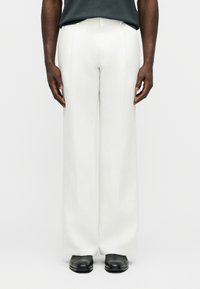 Льняные брюки