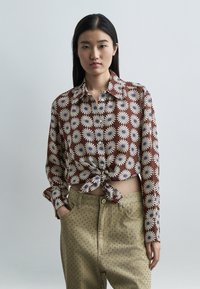 Шелковая блузка