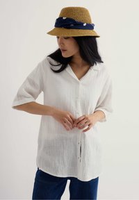 Длинная блузка