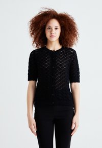 Вязаная кофта